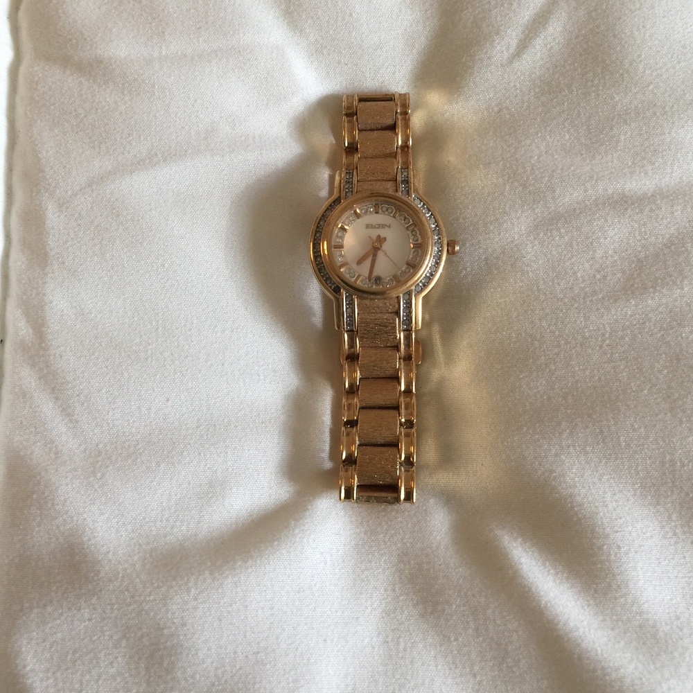 Bulova Women’s Gold Plated Watch - with crystal around and on watch